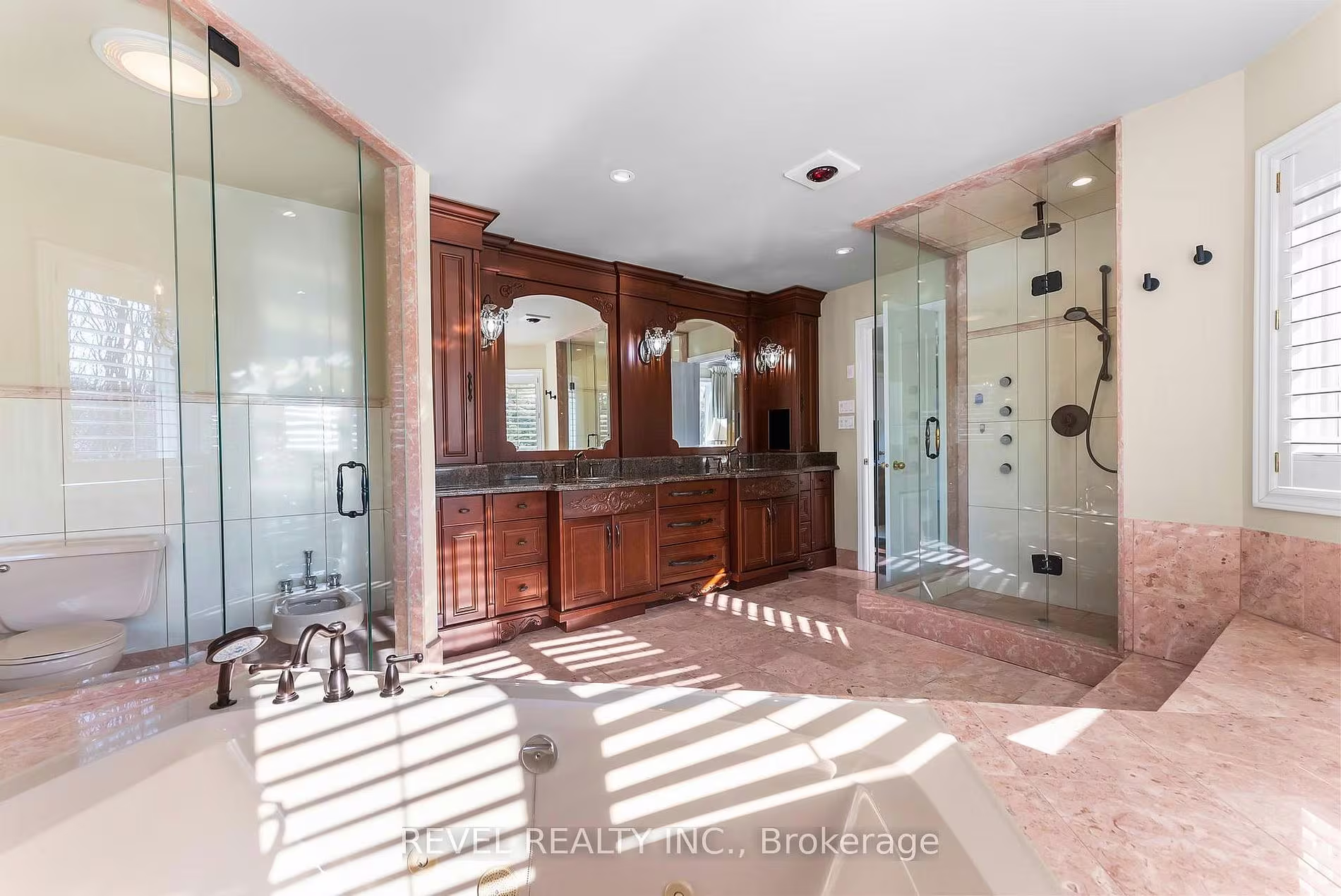 Primary 6-piece ensuite with a double vanity and glass shower at 1486 Ashwood Gate, Pickering, listed by The Gordon Brothers Team, Revel Realty Inc., Brokerage