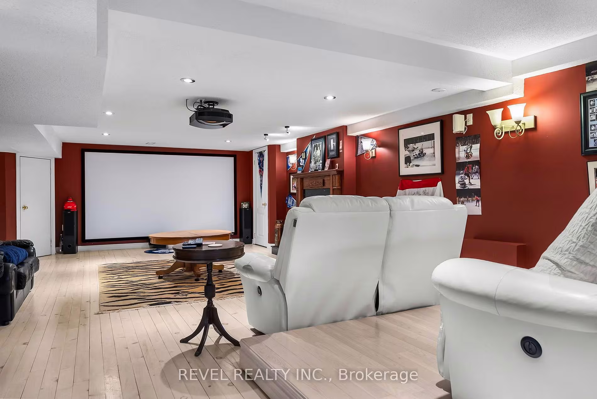 Basement home theatre with tiered seating at 1486 Ashwood Gate, Pickering, listed by The Gordon Brothers Team, Revel Realty Inc., Brokerage