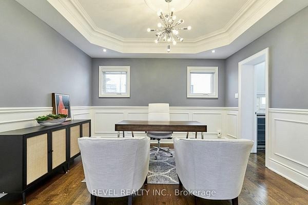 Formal dining room with a coffered ceiling and custom built-ins at 475 Poplar Avenue, Ajax