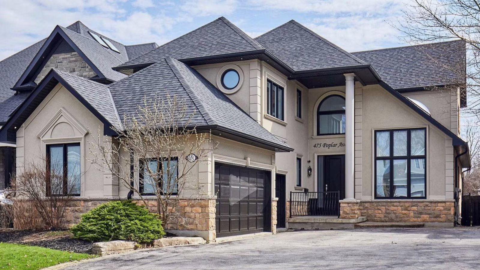 475 Poplar Ave, Ajax, a custom detached home with stone exterior and double garage, for sale with The Gordon Brothers Team