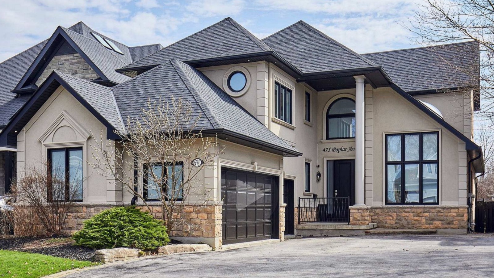 475 Poplar Avenue, Ajax: a custom two-storey detached home with stone and stucco exterior, listed by The Gordon Brothers Team, Revel Realty Inc., Brokerage
