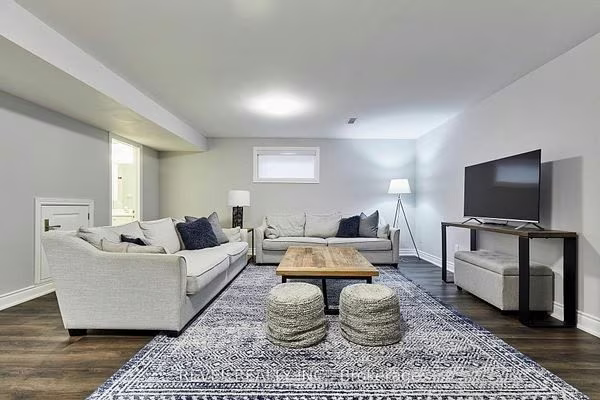 Finished lower-level living room at 475 Poplar Avenue, Ajax