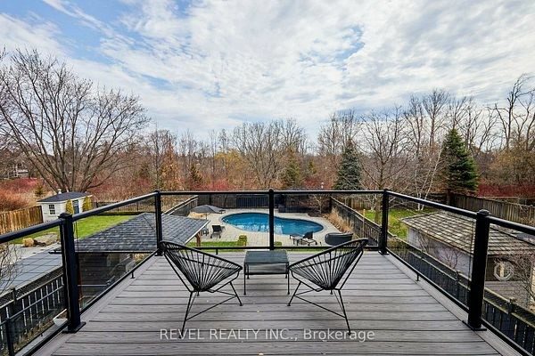 Elevated deck overlooking the inground saltwater pool at 475 Poplar Avenue, Ajax